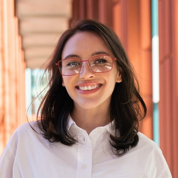 Home successful smiling business woman wearing eyeglasses e1684464588850.jpg